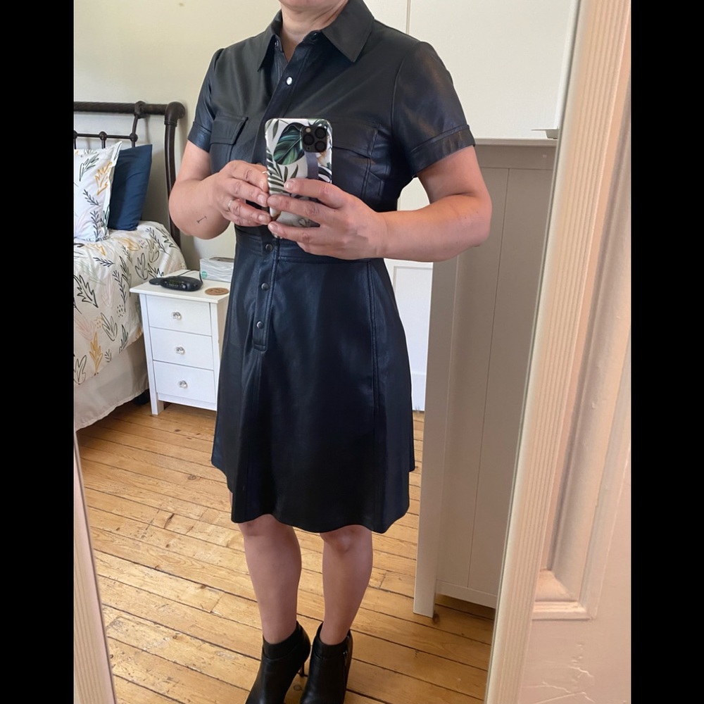 BCBG beautiful black dress. Faux leather. Size Small.